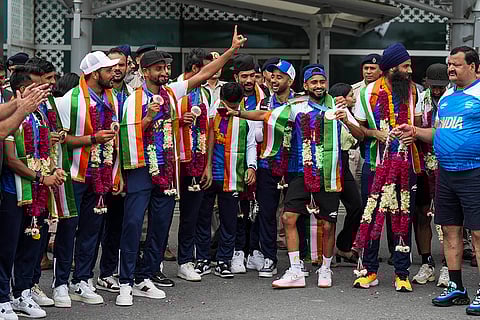 Paris Olympic Bronze medalist Indian Hockey players pose for photos at the IGI Airport
